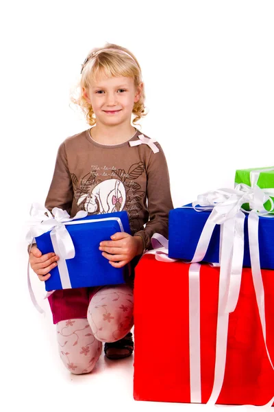 Krásná holčička s dárky — Stock fotografie