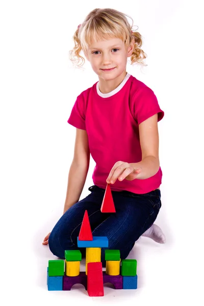 Children building a castle with cubes — Stock Photo, Image