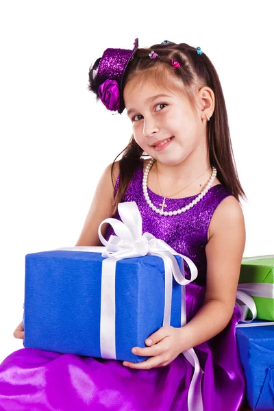 Beautiful little girl with presents — Stock Photo, Image