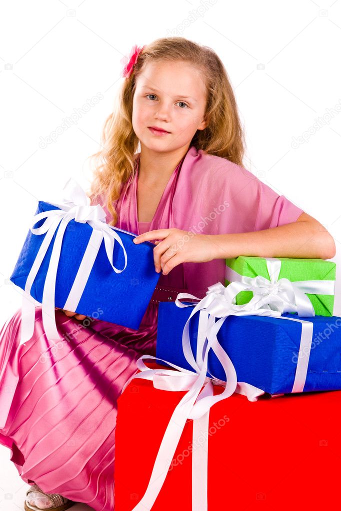 Beautiful little girl with presents Stock Photo by ©Len44ik 9447382