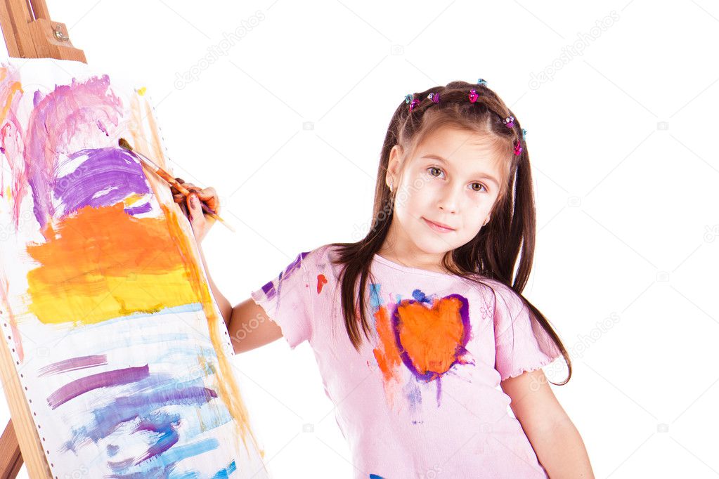 Beautiful little girl painting
