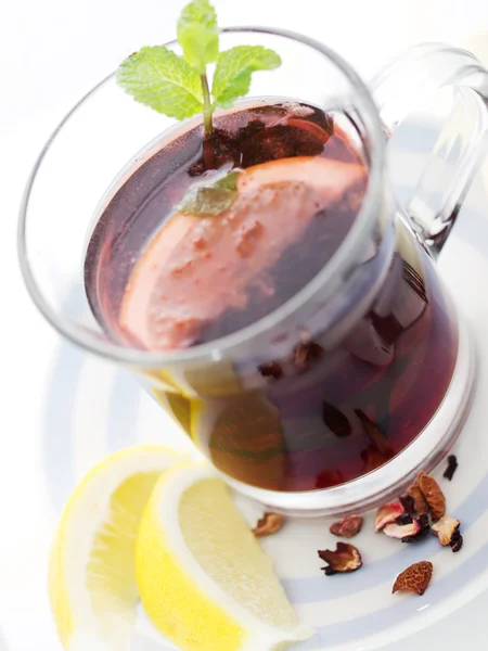 Stock image Blend tea in glass cup with mint and lemon