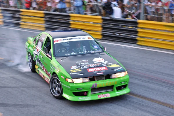 BANGSAEN, THAILAND - FEB. 5 : Unidentified driver from ptt performa team drifting the car during the Bangsaen Thailand Speed Festival on february 5, 2012 in Ban — Stock Photo, Image