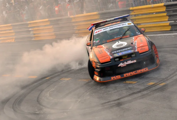 BANGSAEN, THAILAND - FEB. 5 : Unidentified driver from ptt performa team drifting the car during the Bangsaen Thailand Speed Festival on february 5, 2012 in Ban — Stock Photo, Image