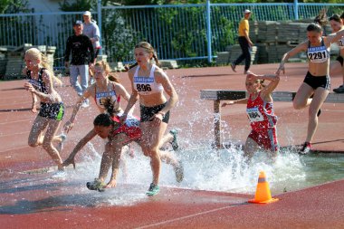 Girls on the 2000 meters steeplechase race clipart