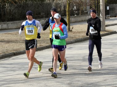 Unidentified men at the 20,000 meters race walk clipart