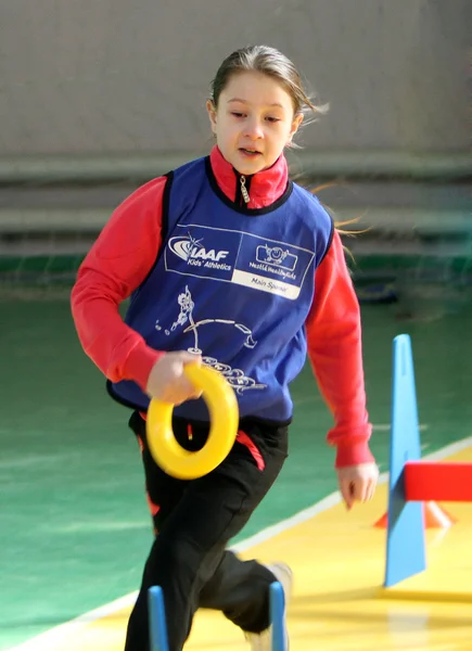 Unidentified girl on IAAF Kid’s Athletics competition — Stock Photo, Image