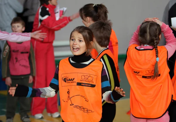 Неизвестные дети на соревнованиях ИААФ по лёгкой атлетике — стоковое фото