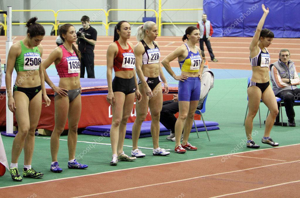 Unidentified girls on the start of the 400 meters dash Stock Editorial Photo © DenysKuvaiev