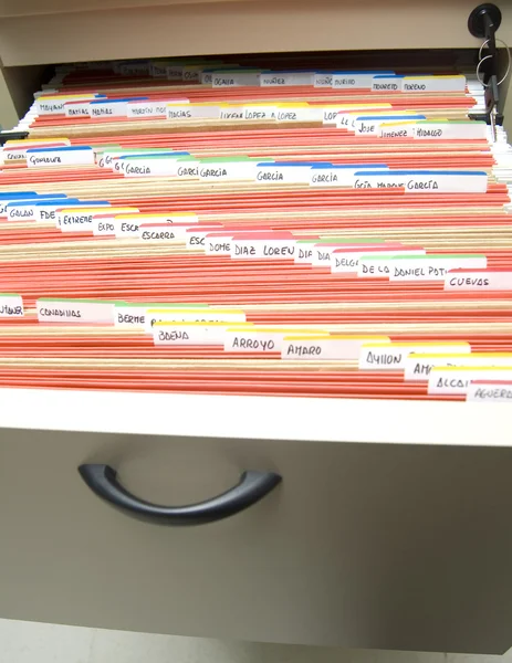 Filing cabinet with folders arranged — Stock Photo, Image