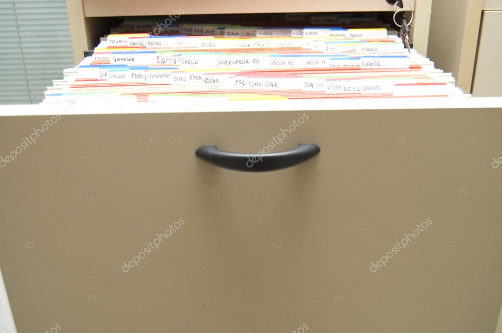 Filing cabinet with folders arranged