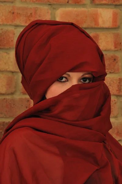 Woman veiled by scarf — Stock Photo, Image