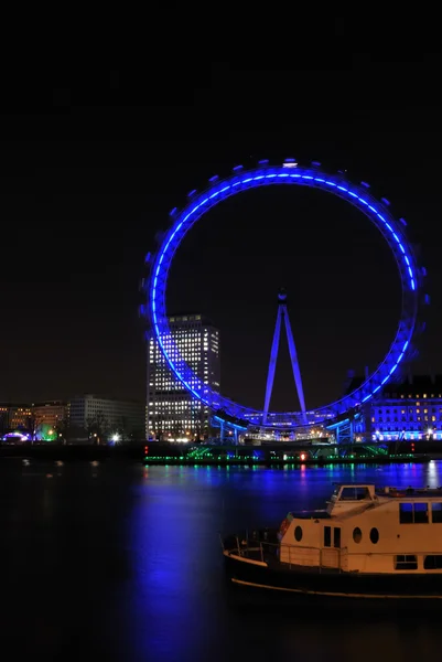 stock image London eye by night