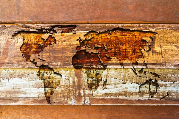 Mapa del mundo en la textura de madera — Foto de Stock