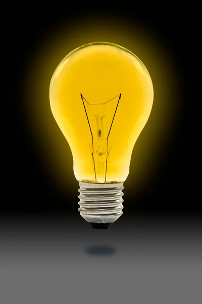 Yellow light bulb — Stock Photo, Image