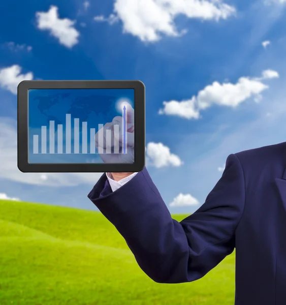 Hand pointing higher graph on tablet PC — Stock Photo, Image