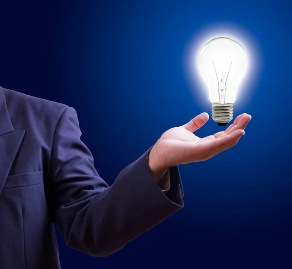 Light bulb on hand — Stock Photo, Image