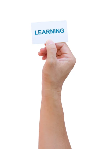 Mão segurando cartão de nome de aprendizagem isolado com caminho de recorte — Fotografia de Stock