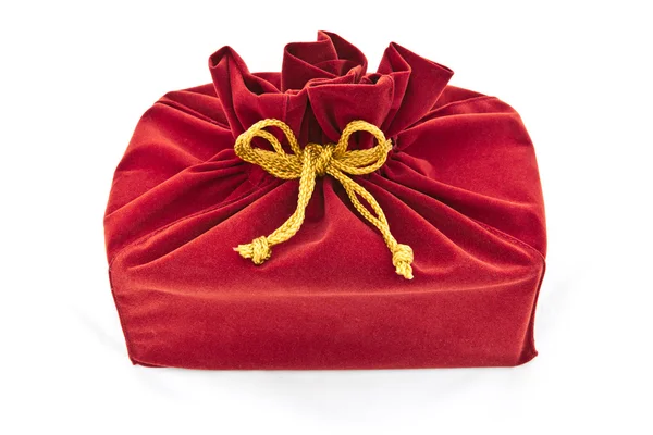 Красная ткань подарочная сумка — стоковое фото
