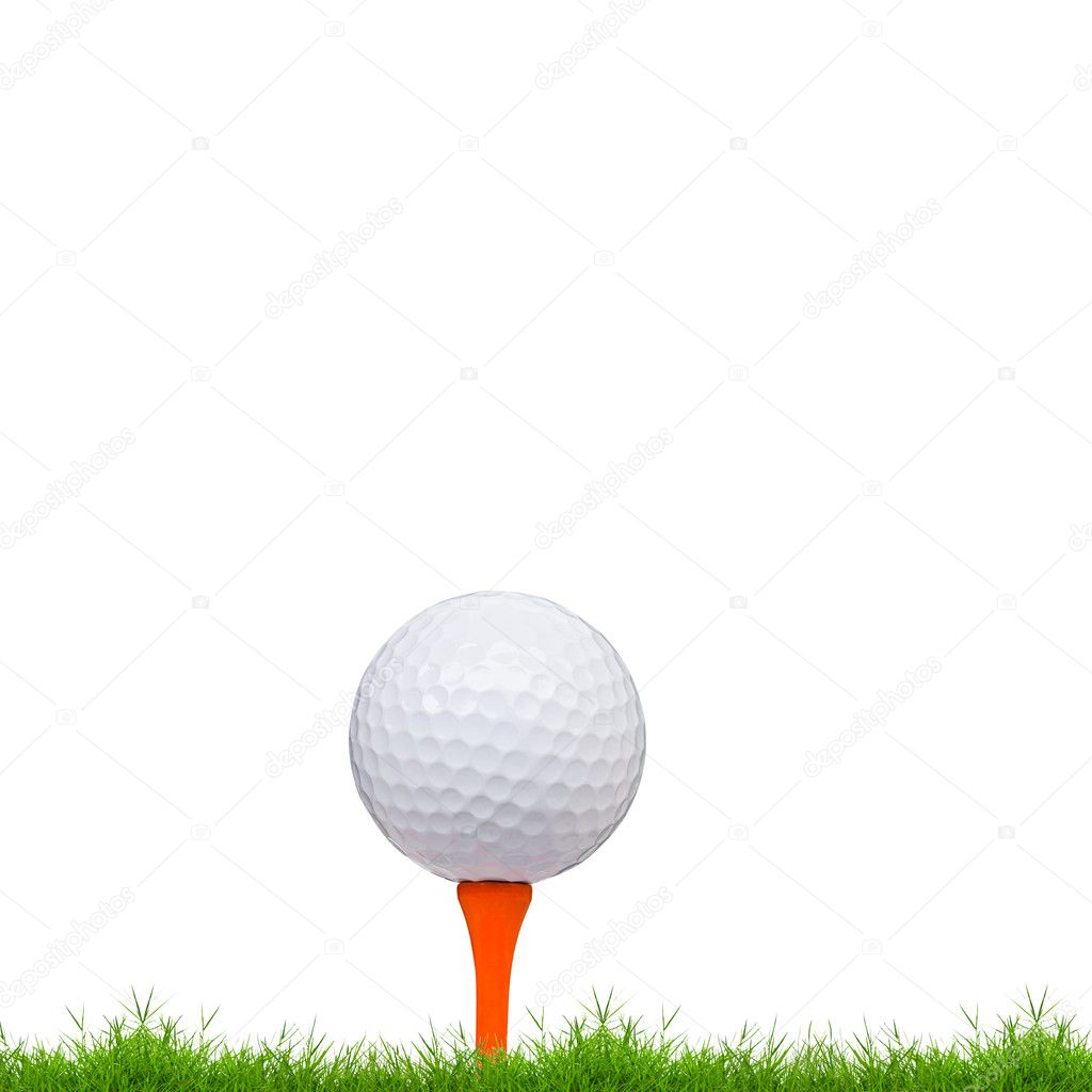 Golf ball and tee on green grass isolated