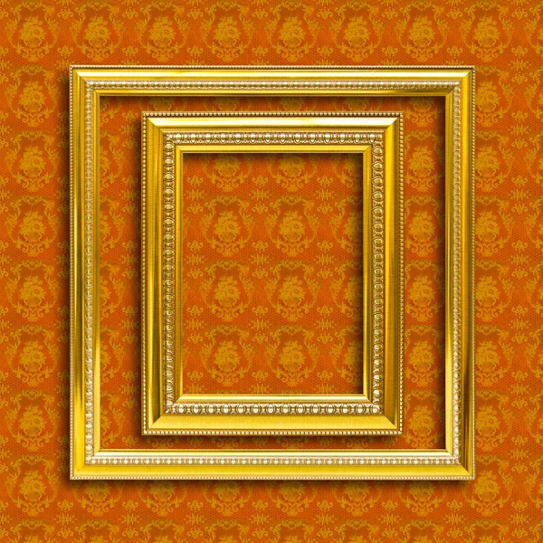 Rahmen aus goldenem Holz auf der Tapete — Stockfoto