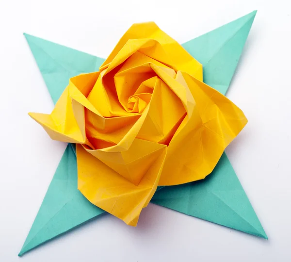 Origami een gele roos Stockfoto