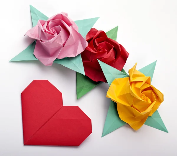 Origami ένα multi χρωματιστά τριαντάφυλλα Εικόνα Αρχείου