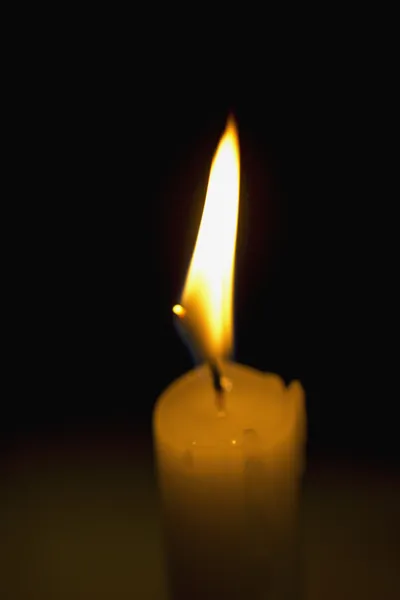Antigua vela encendida — Foto de Stock
