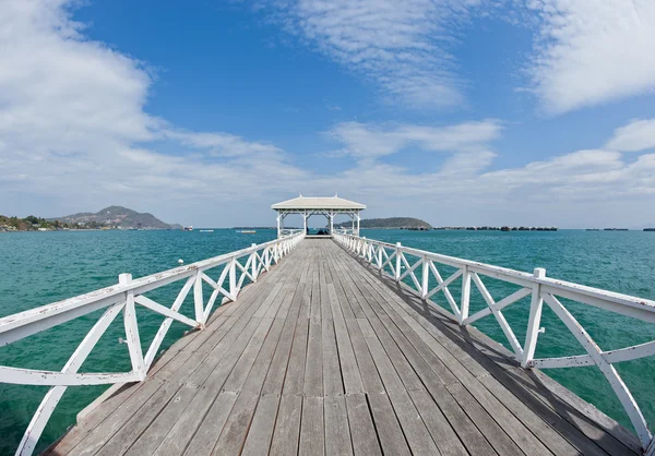 Wooden long bridge reach out the sea — Stock Photo, Image