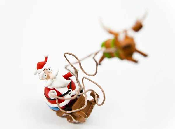 Zoom in Kerstman in slee — Stockfoto