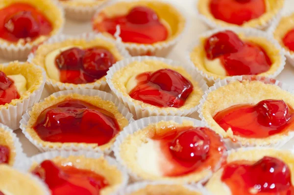 stock image Red Cherry pie in small cup of zigzag edge