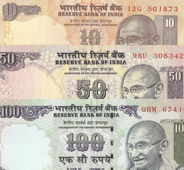 Frammento di banconote indiane - 10, 50 e 100 rupie indiane, il campione in — Foto Stock