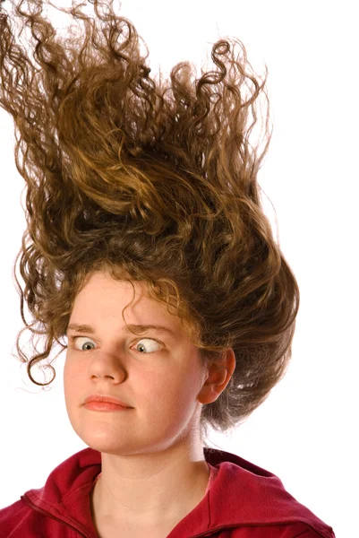 Vrouw met wind geblazen haar — Stockfoto