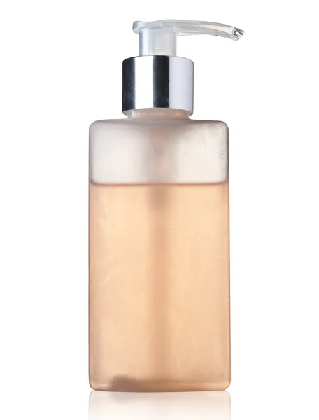 Uma garrafa de perfume sobre fundo branco . — Fotografia de Stock