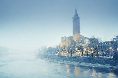Sant' Anastasia Church in thick fog, Verona - Italy clipart