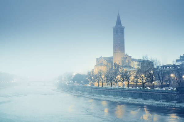 Sant' Anastasia Church in thick fog, Verona - Italy
