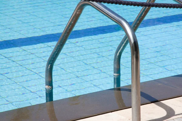 Swimming pool and handrail — Stock Photo, Image