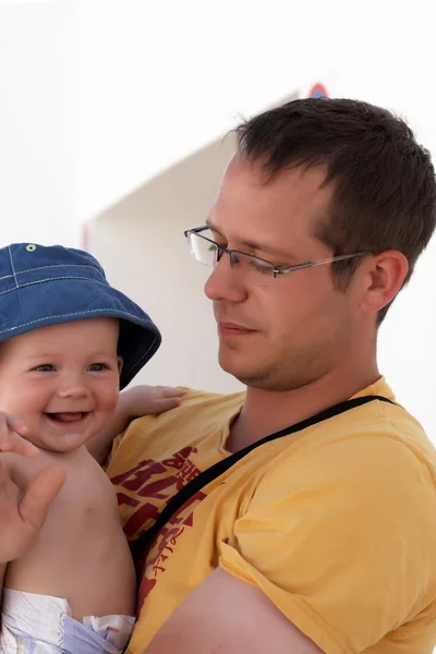 Father and son having a cuddle — Stock Photo, Image