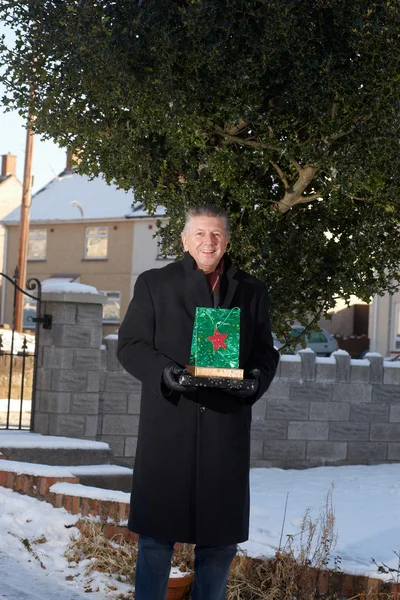 stock image A man delivering presents