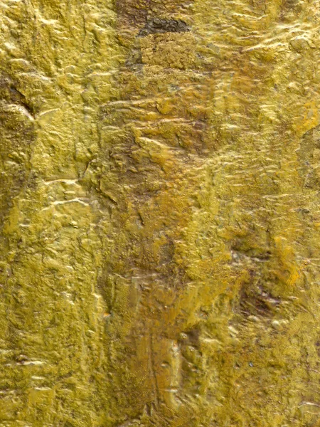 Zlatá kamenná textura pozadí — Stock fotografie