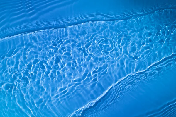 青い水リップル背景 — ストック写真