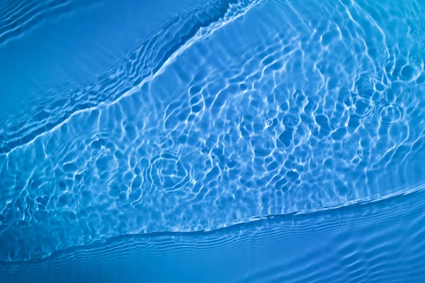 Tło marszczyć niebieski wody — Zdjęcie stockowe