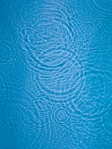 Blauwe cirkel water rimpel achtergrond — Stockfoto