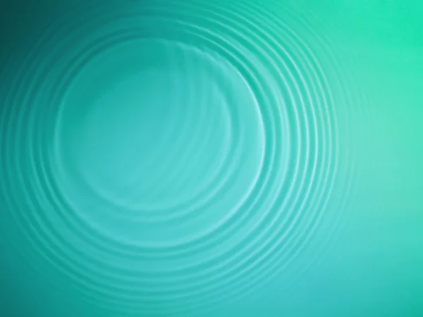 緑の円水リップル背景 — ストック写真