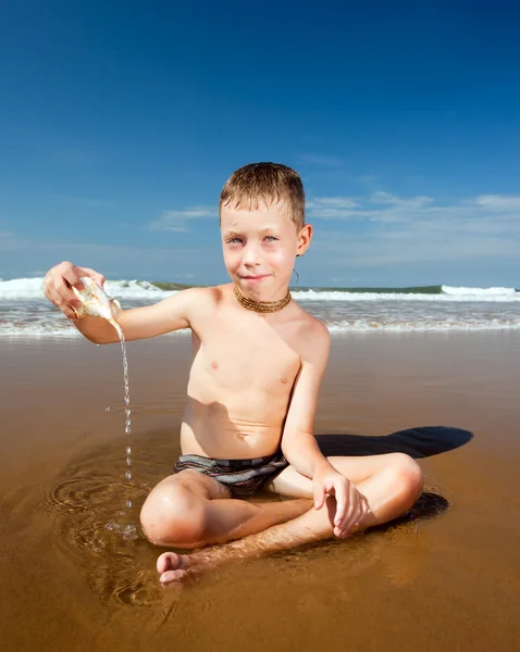 stock image Boy on the beach