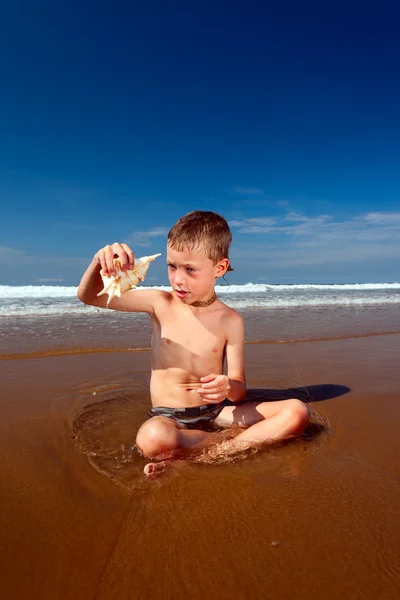 stock image Boy on the beach