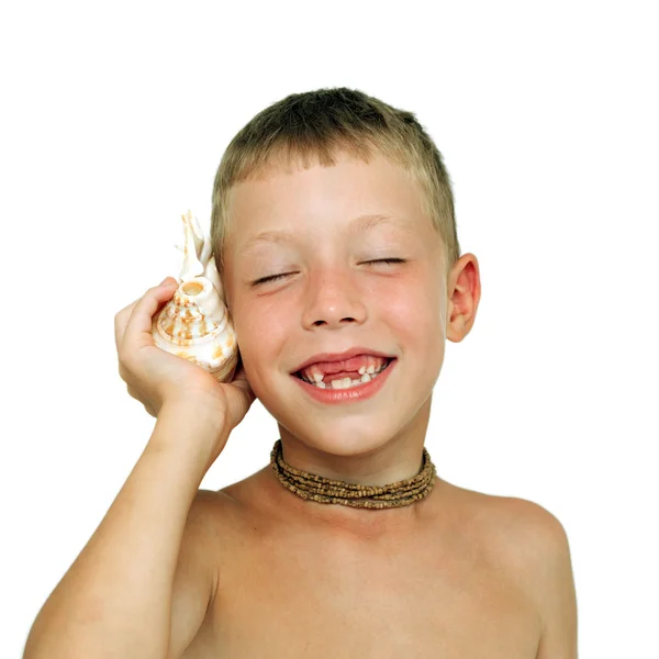 Boy and shell — Stock Photo, Image