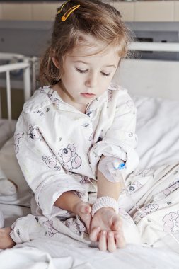 Sick girl in hospital clipart