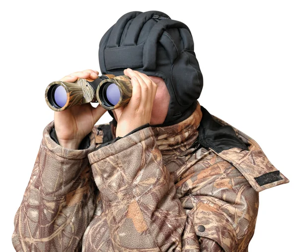 stock image A man looking through binoculars