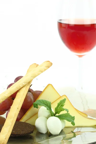 Appetizer with cheese, grissini and grapes — Stock Photo, Image